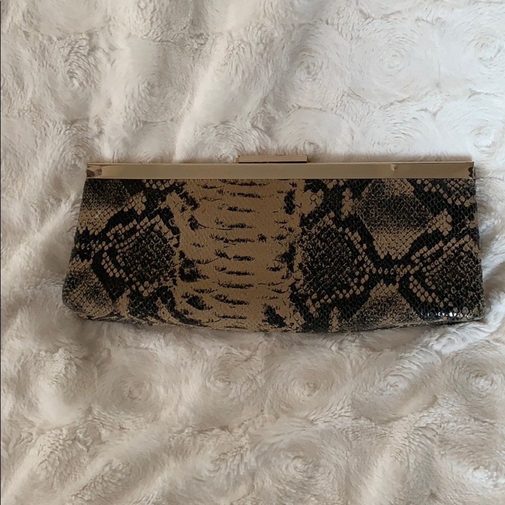⭐️ Calvin Klein snake print clutch